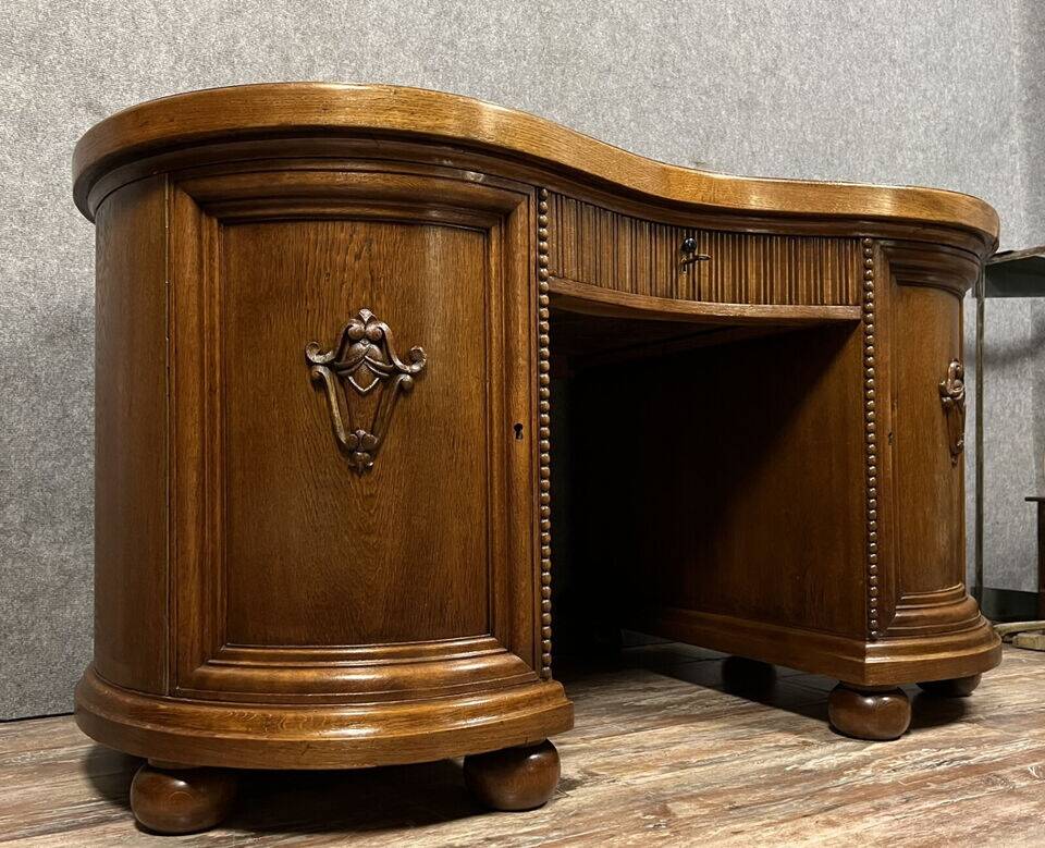 Art Nouveau period bean-shaped oak and walnut center desk