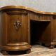 Art Nouveau period bean-shaped oak and walnut center desk