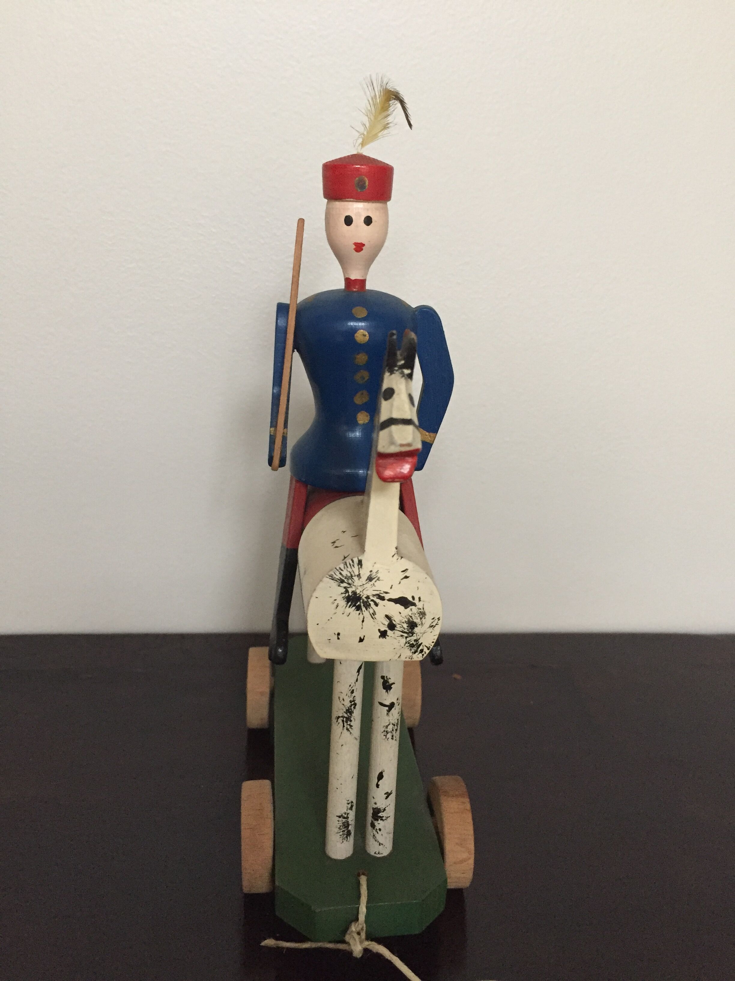 Soldier on wooden horse to shoot