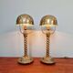 Pair of table lamps in bronze and brass, early 20th century.