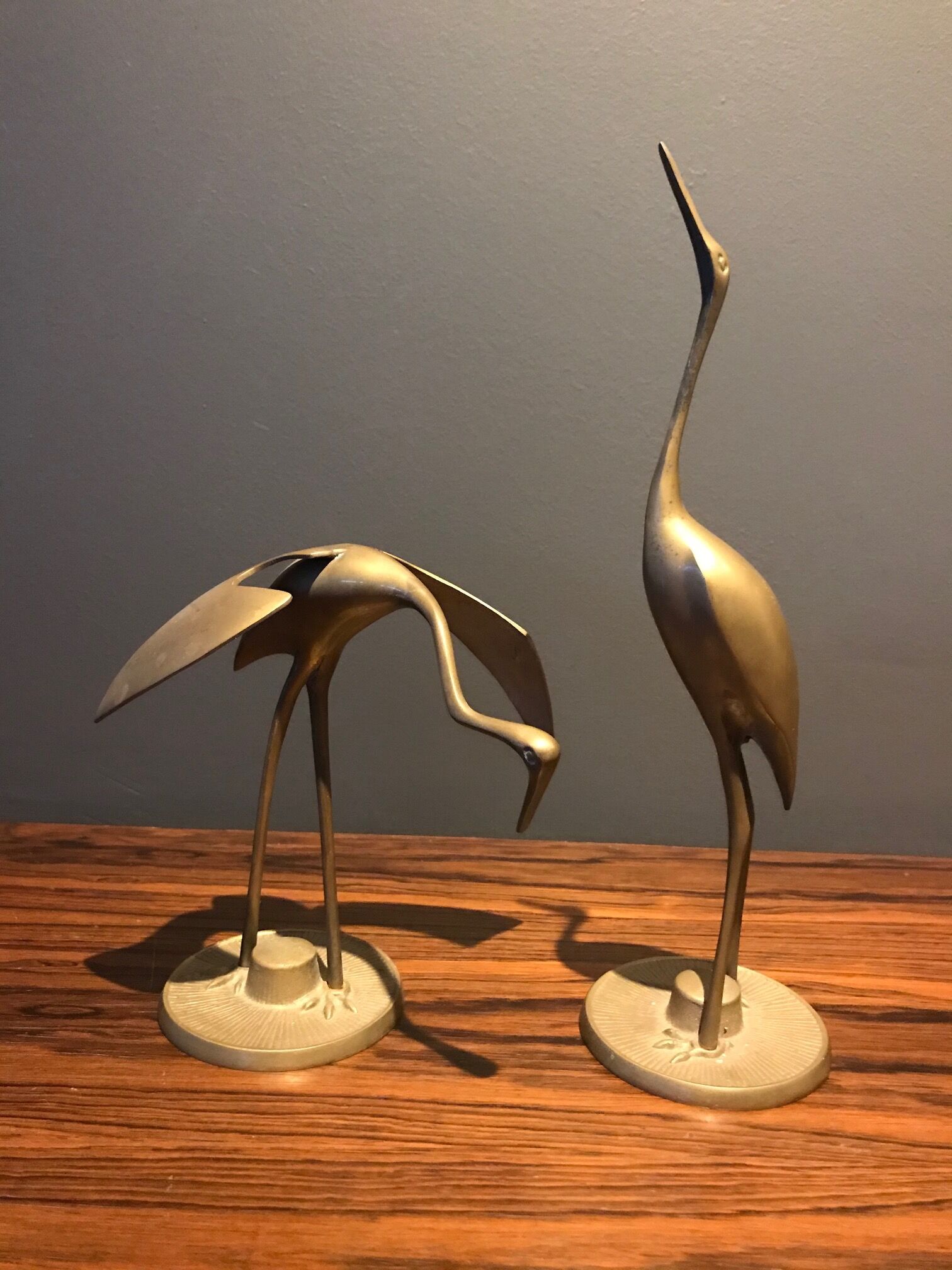 Pair of brass deco stork