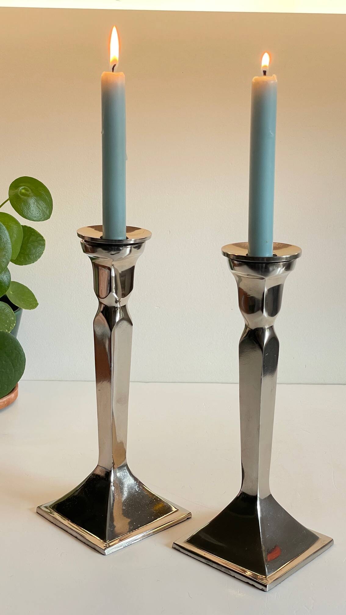 Pair of vintage cast aluminum candlesticks