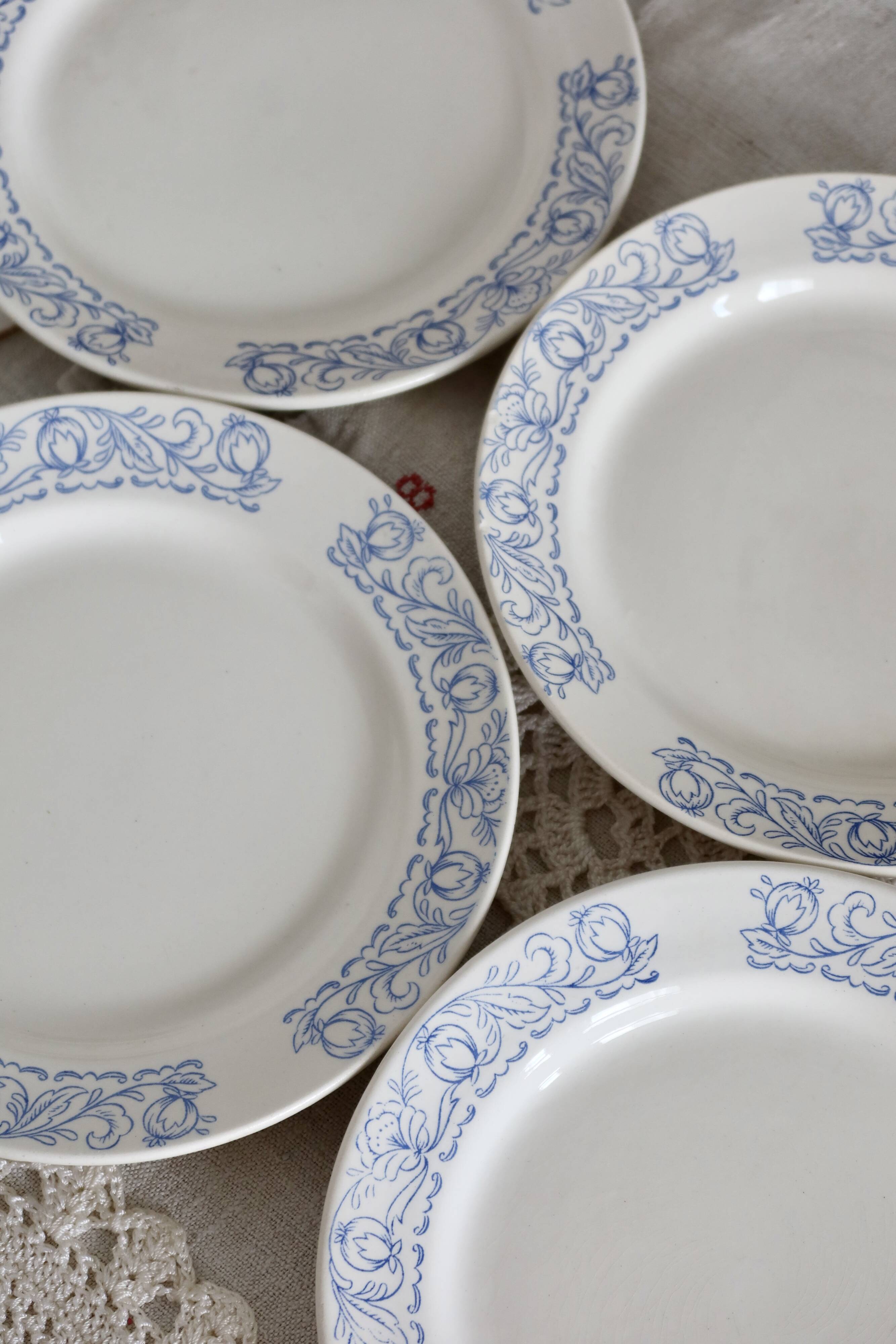 4 vintage porcelain dessert plates with blue border