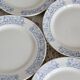 4 vintage porcelain dessert plates with blue border
