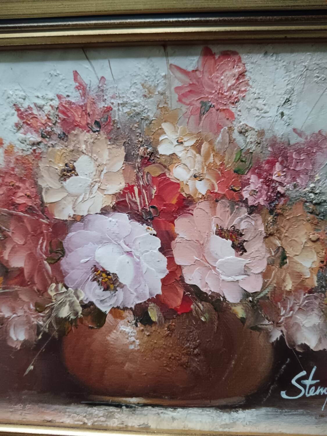 Oil of a bouquet and its lovely frame