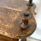 Old shelf in turned wood like reels