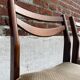 Lot of 4 vintage Scandinavian chairs in wood and golden fabric.