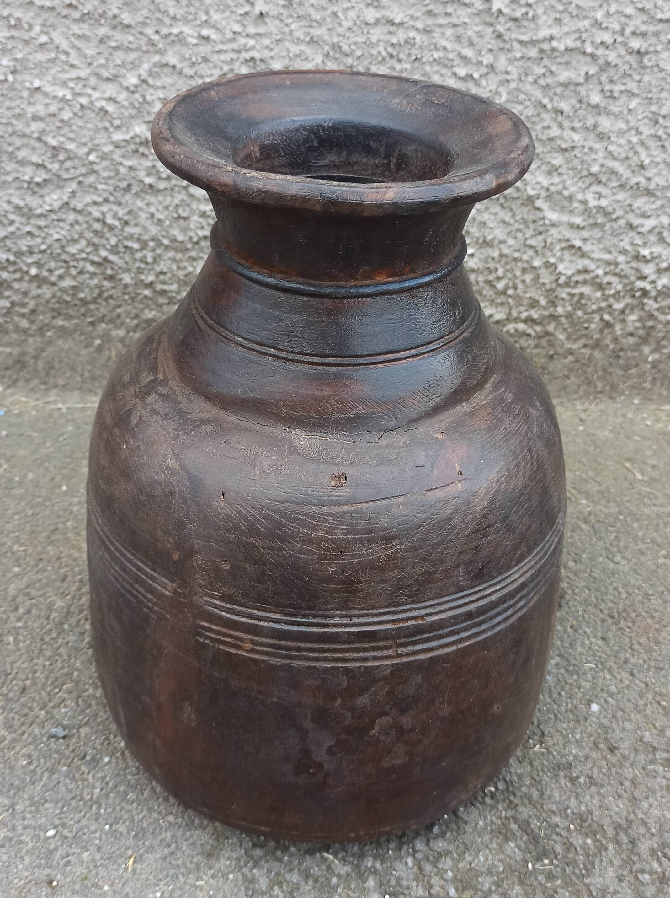 Small old wooden pot