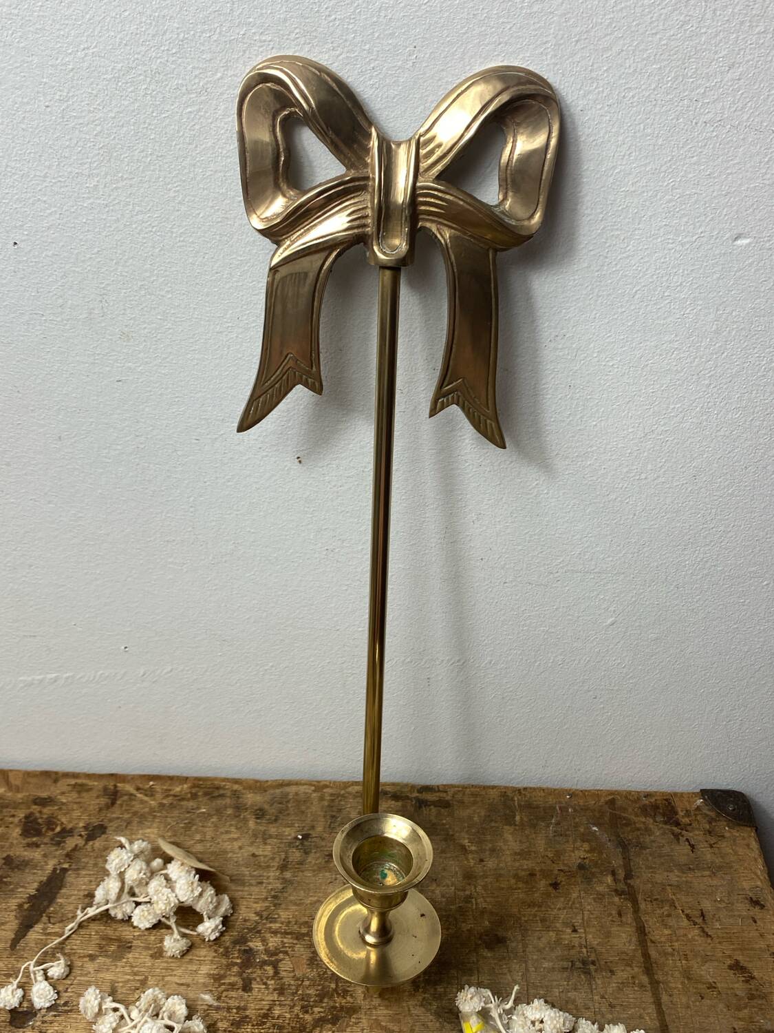 Solid brass bow and ribbon wall candle holder