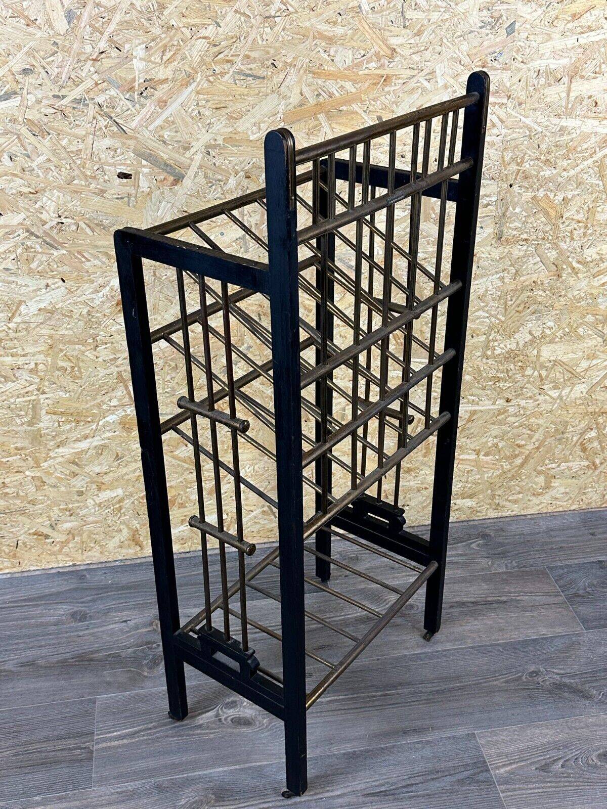 Magazine rack from Wiener Werkstätte Austria made of mahogany & brass around 1900