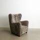 Fauteuil en peau de mouton danois du milieu du siècle par Fritz Hansen, années 1940.