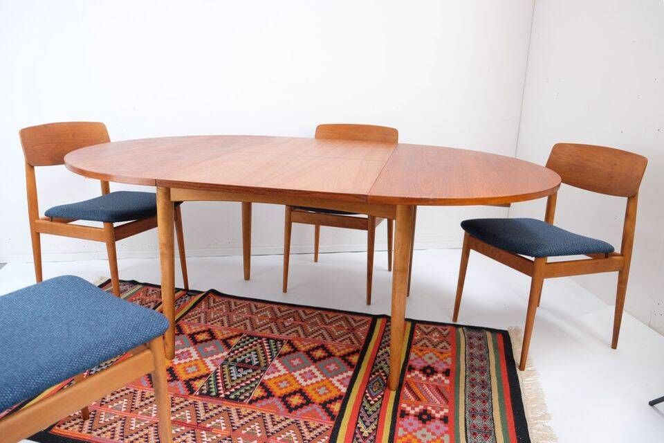 1960s/70s-style teak dining table by ASKO, with a retro vintage design.