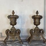 Pair of Louis XIV style andirons in bronze after a design by André-Charles Boulle.