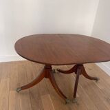 Antique table with wrought iron leg