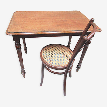 Writing table and Kohn chair 142