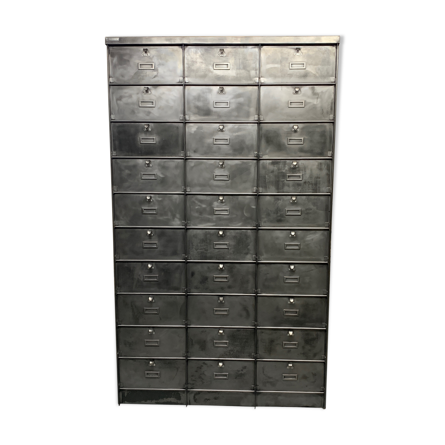 Industrial cladding furniture in brushed and patinated steel