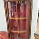 Corner display case in wood veneer with musical instrument marquetry
