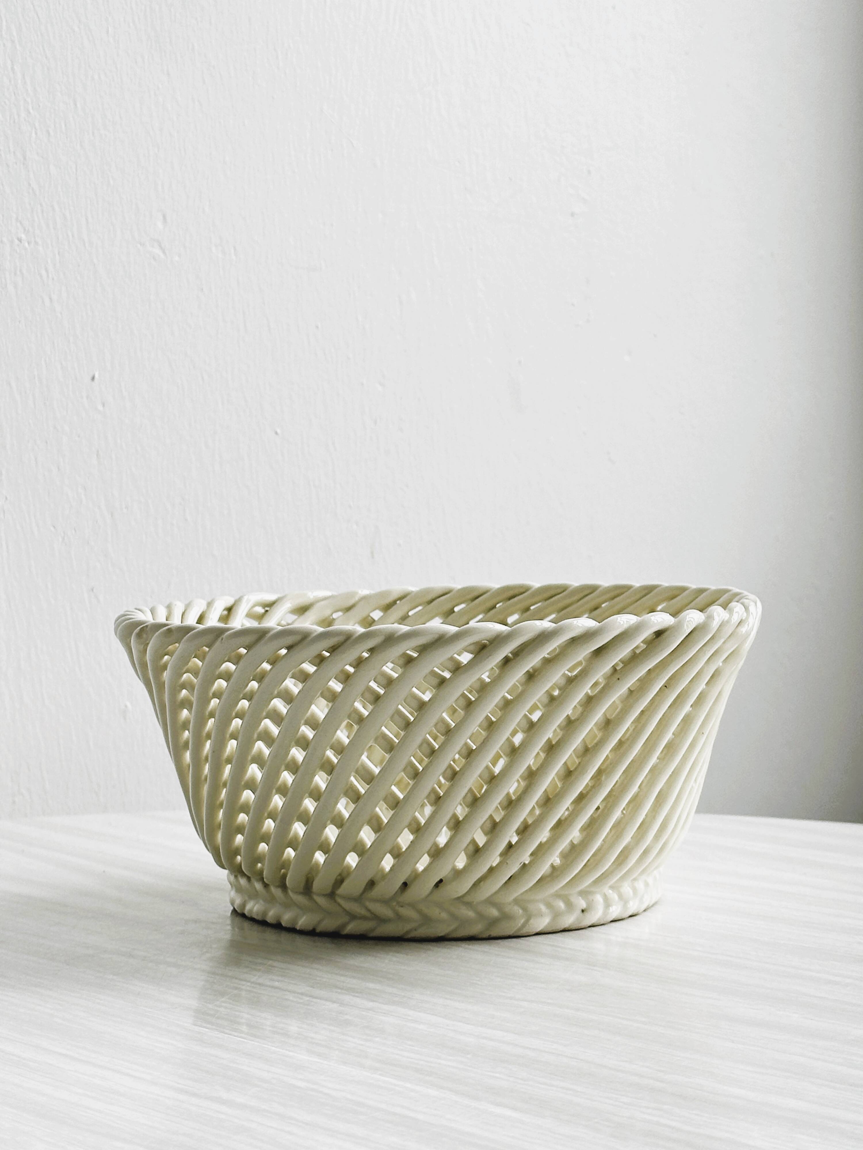 Bread basket - openwork white ceramic bowl.