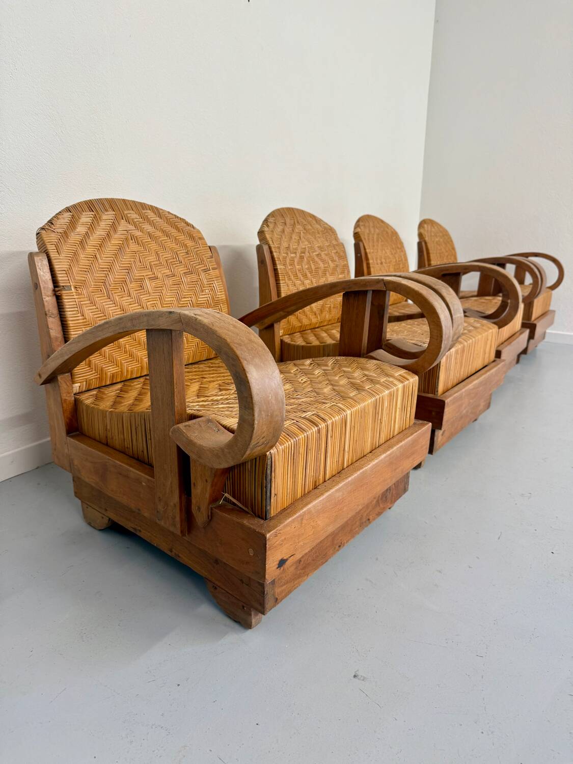 Set of 4 woven rattan armchairs, colonial style, 1950s
