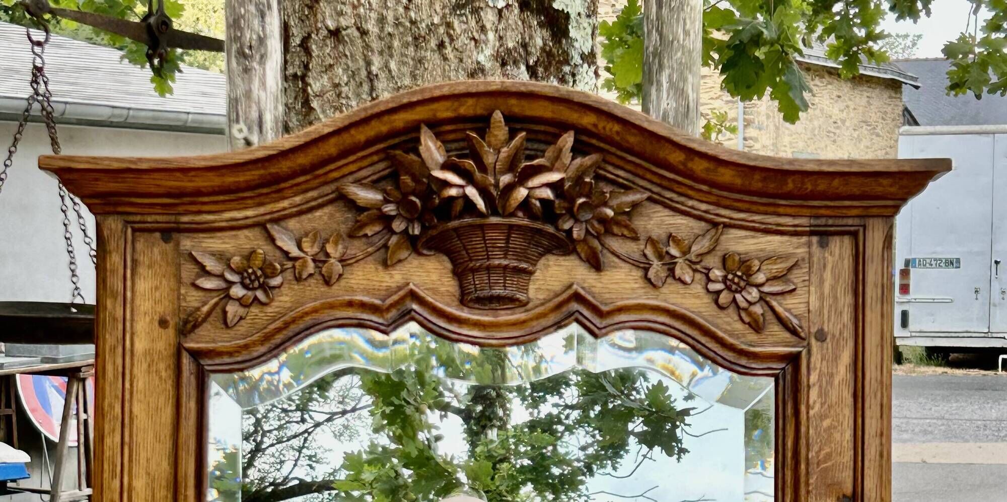 Large and old bevelled framed floor mirror.