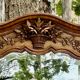 Large and old bevelled framed floor mirror.