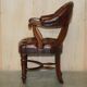 Chesterfield captain's armchair William IV in restored leather with hardwood.
