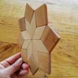 Under the geometric wooden plate