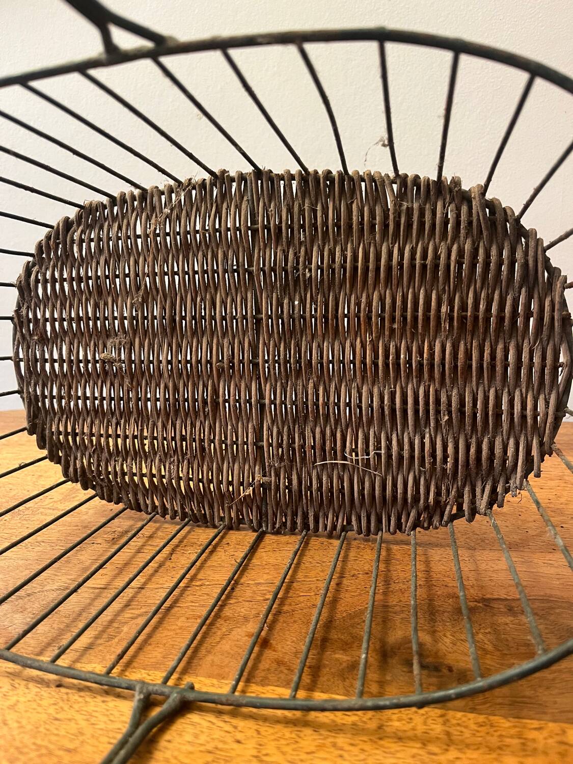 Small wicker and green metal basket