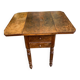 Victorian Pembroke table from the 19th century in walnut burr with drop-leaves.