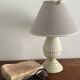 Small bedside lamp in ivory glazed ceramic.