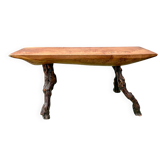 Brutalist bench made of vine and olive wood.
