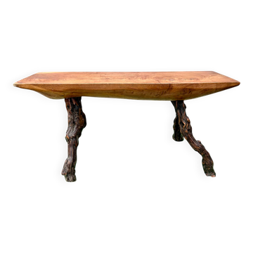 Brutalist bench made of vine and olive wood.