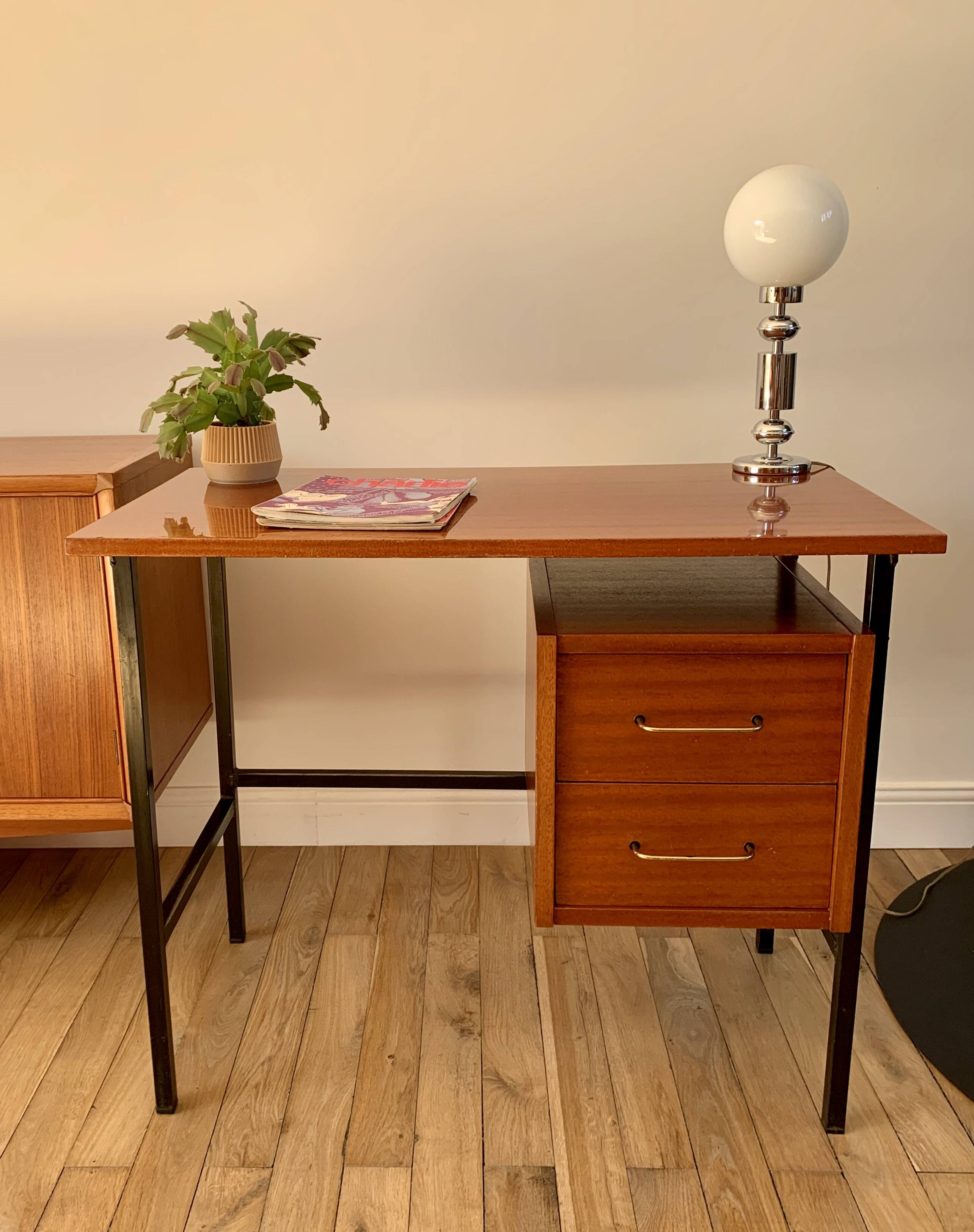 lacquered wood desk and black steel legs design from the 60s and 70s