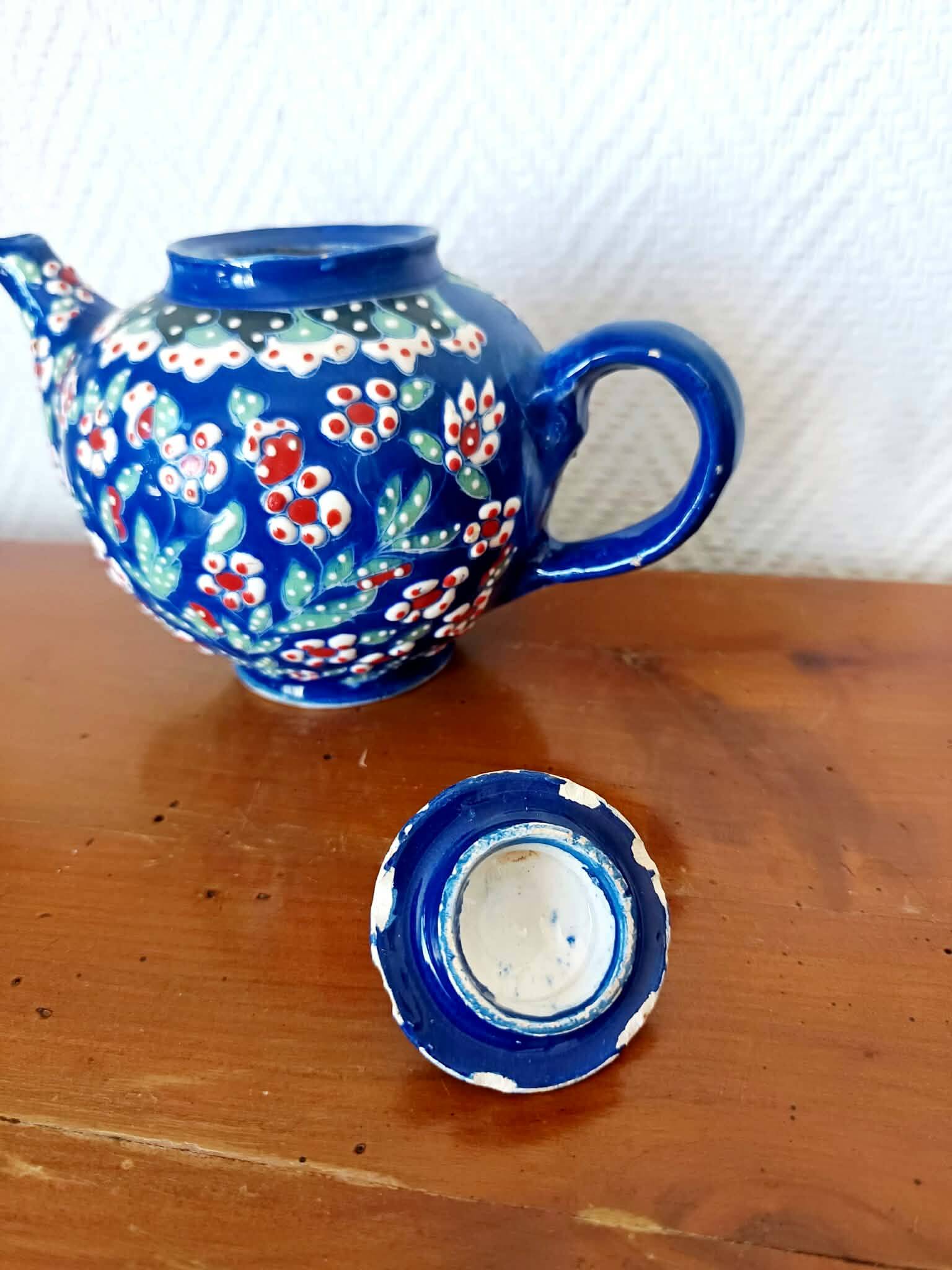 Vintage enamel ceramic teapot