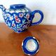 Vintage enamel ceramic teapot