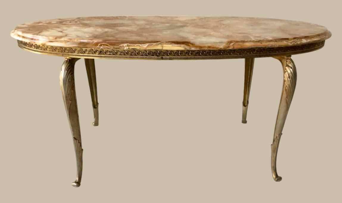 Oval coffee table in onyx and brass 1950