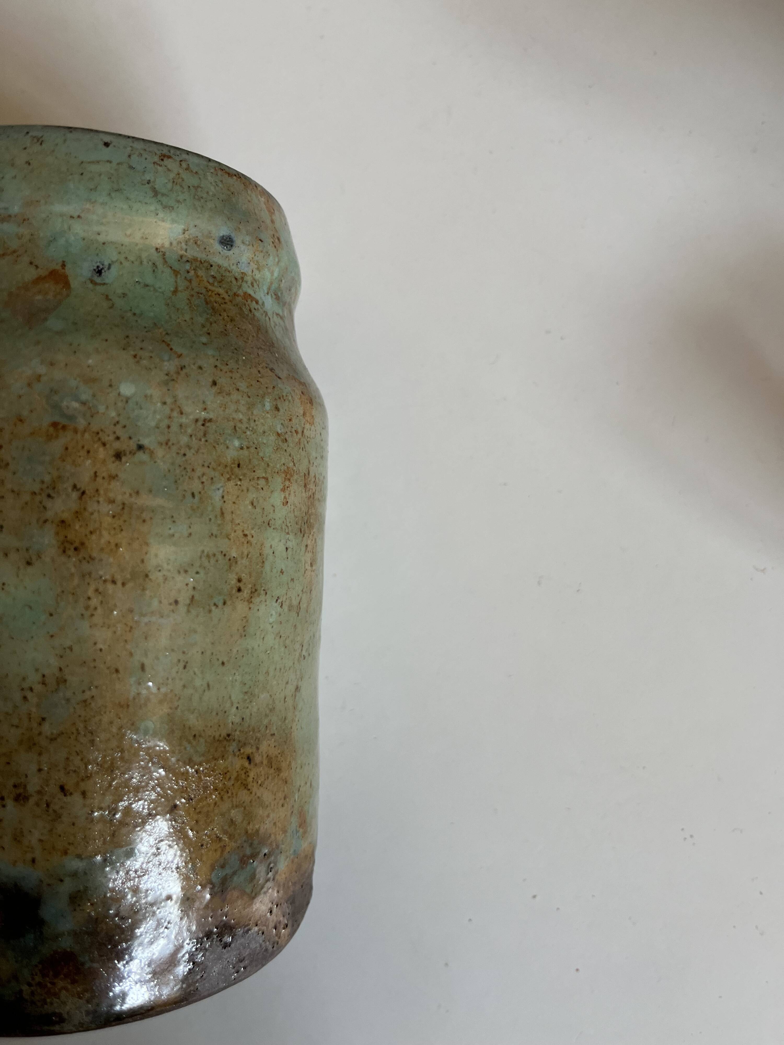 Turquoise and gilded earthenware potter's vase