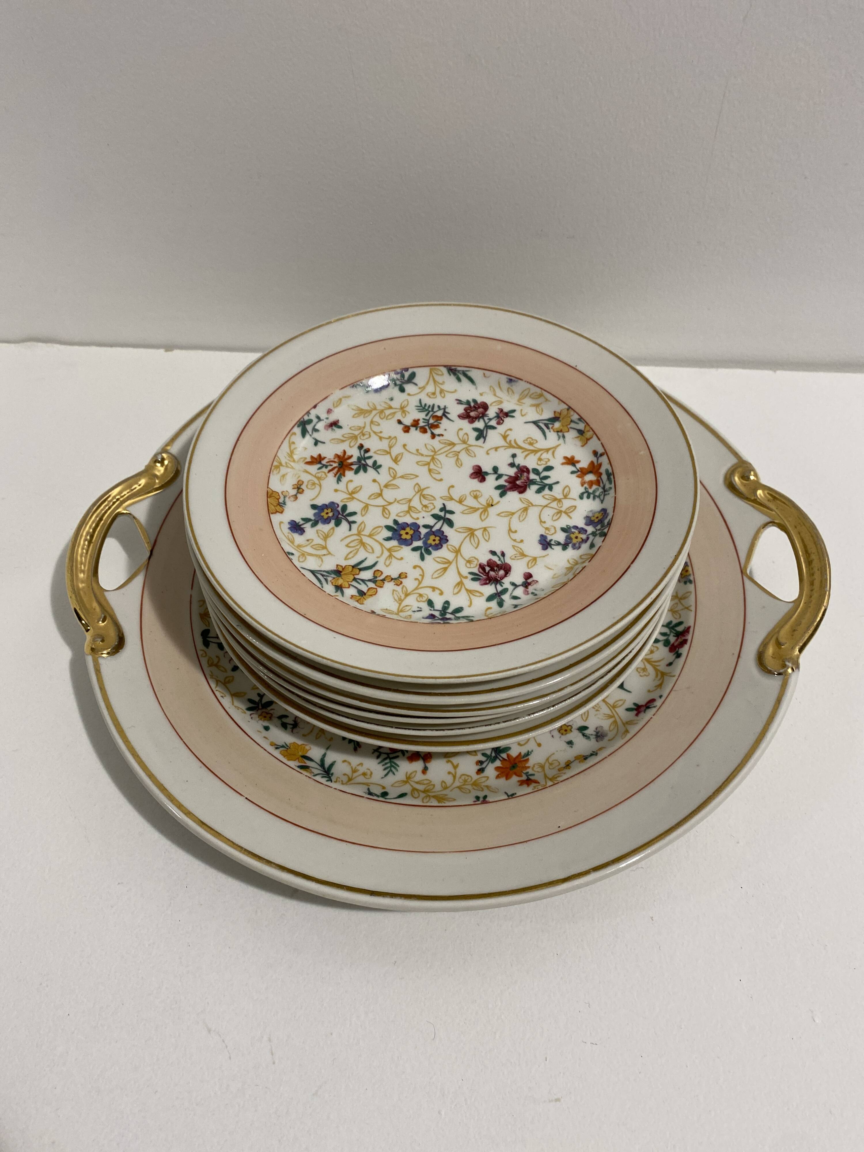 Dessert service, cake service, flowers and gilding, 6 plates and a vintage pie dish.