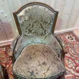 Paire de fauteuils bergères de style Louis XVI