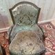 Paire de fauteuils bergères de style Louis XVI