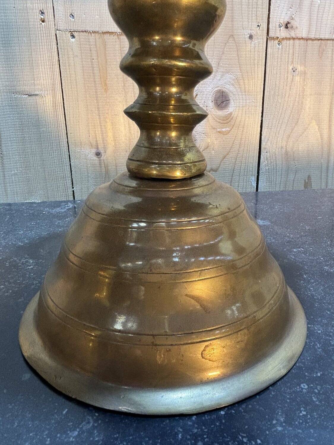 Pair of important brass candle holders
