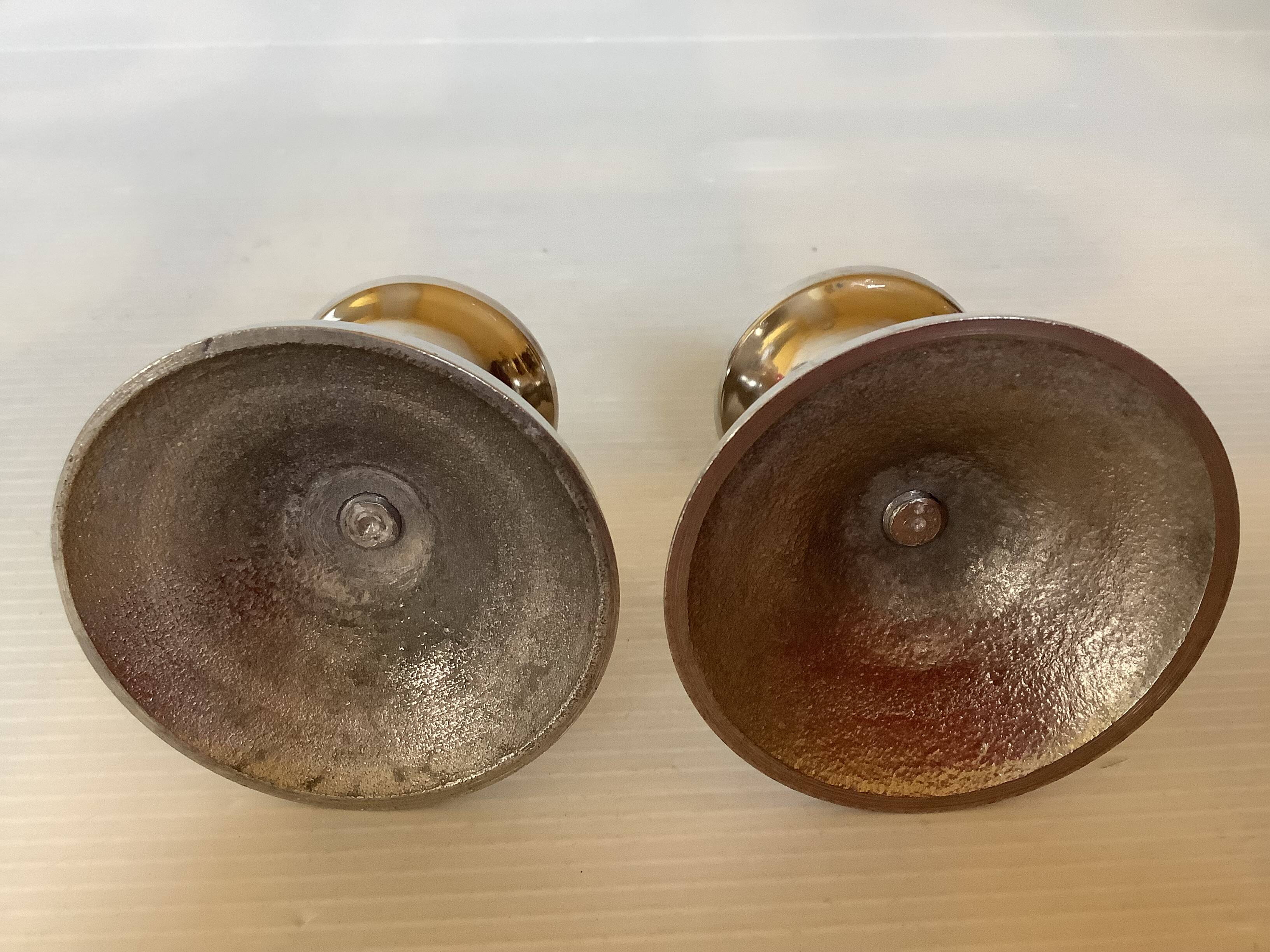 Pair of small silver metal candlesticks