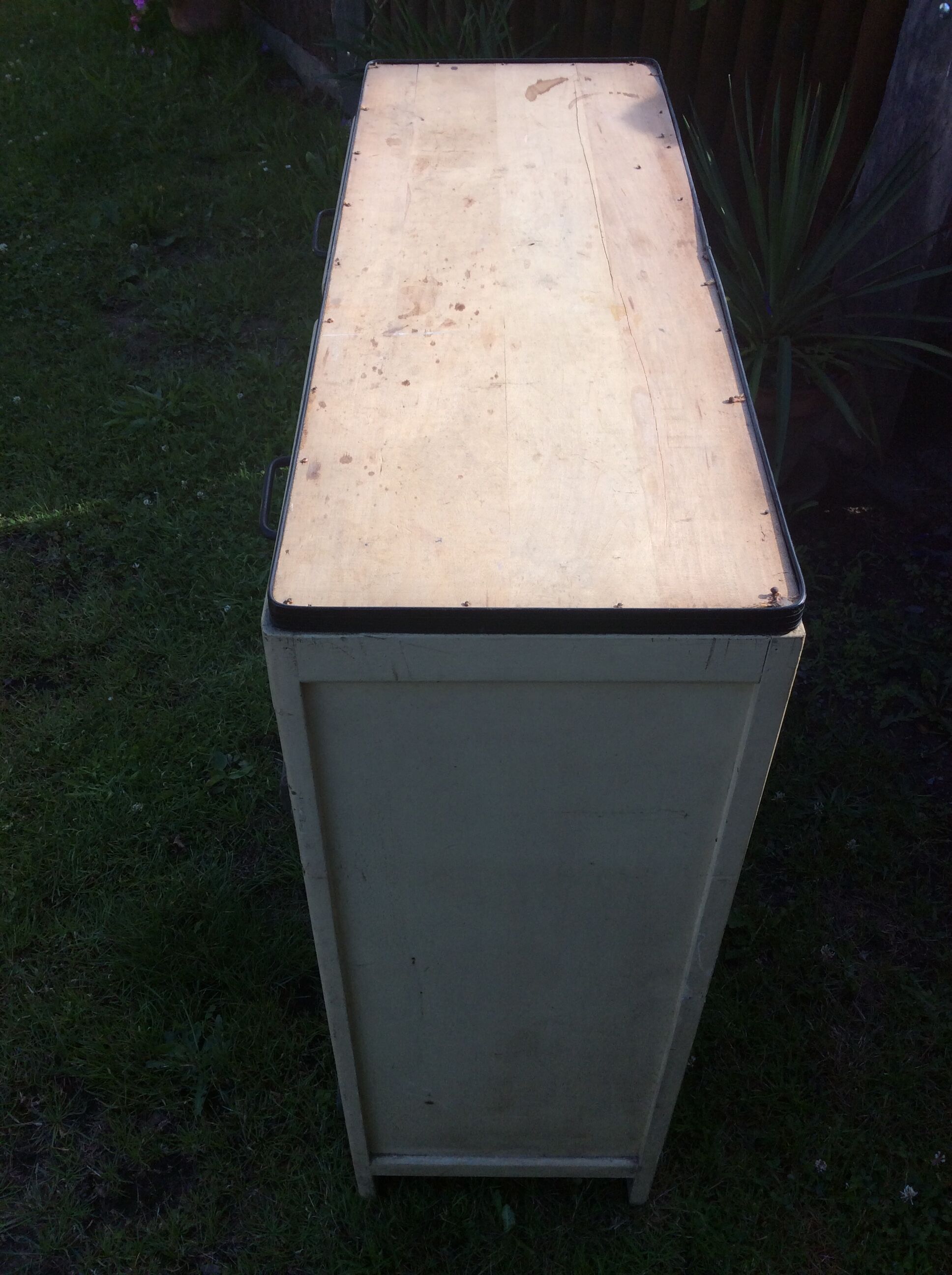 Parisian buffet painted in yellow with 2 doors and 2 drawers from an old Trailer.