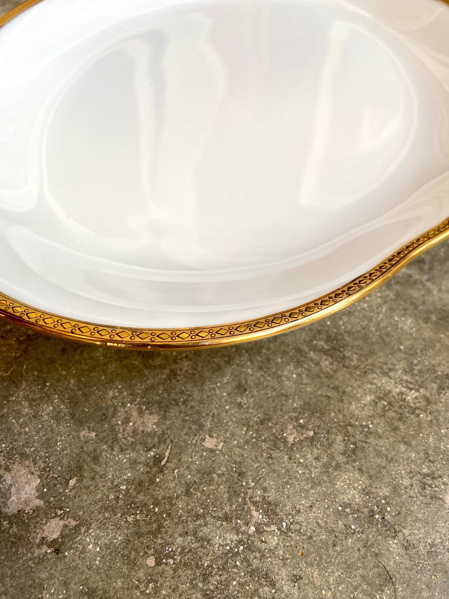 Oval dish in white and golden Limoges porcelain