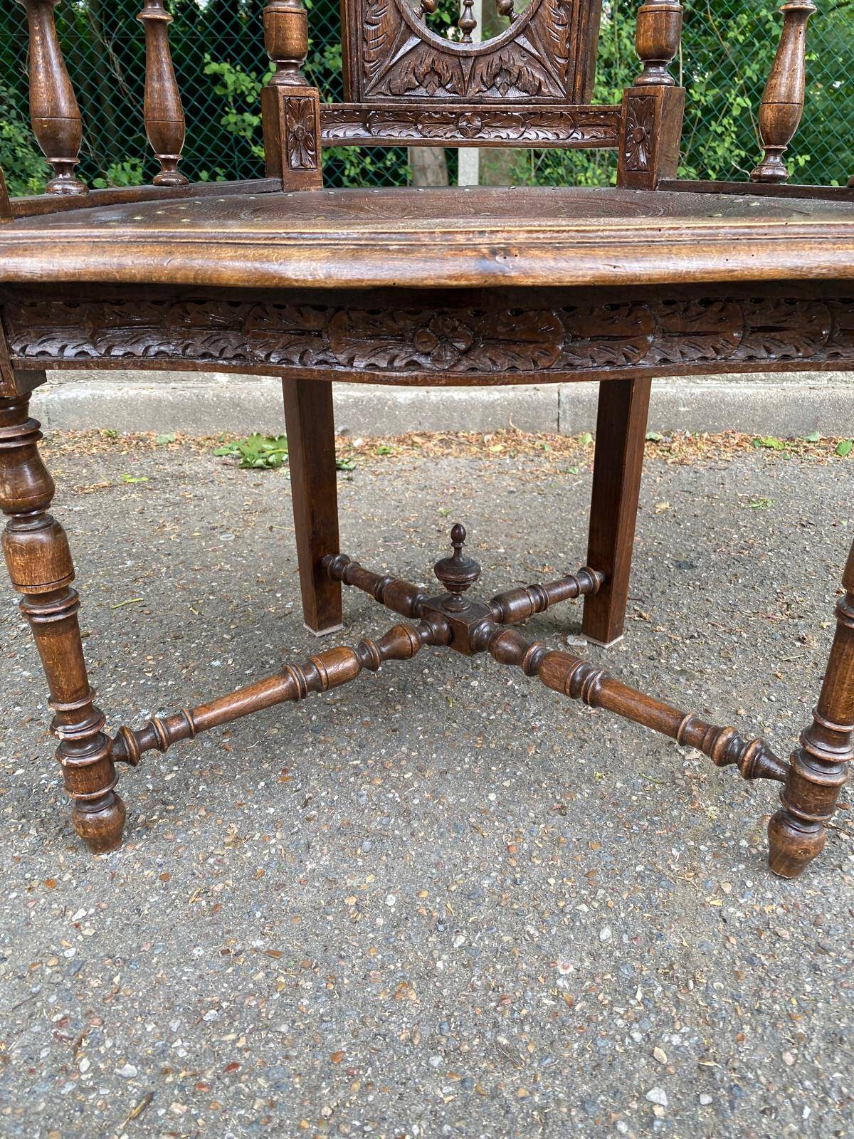 18th century Breton office chair in solid curved and carved wood