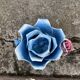 Old barbotine candle holder in the shape of a rose