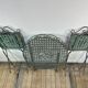 Patinated green folding wrought iron garden set with 1 table + 2 chairs.