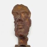 Bronze face - statuette