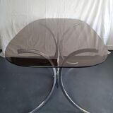 Dining table in chromed metal and smoked glass 1970