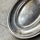 Oval silver-plated metal dish monogrammed "EM"